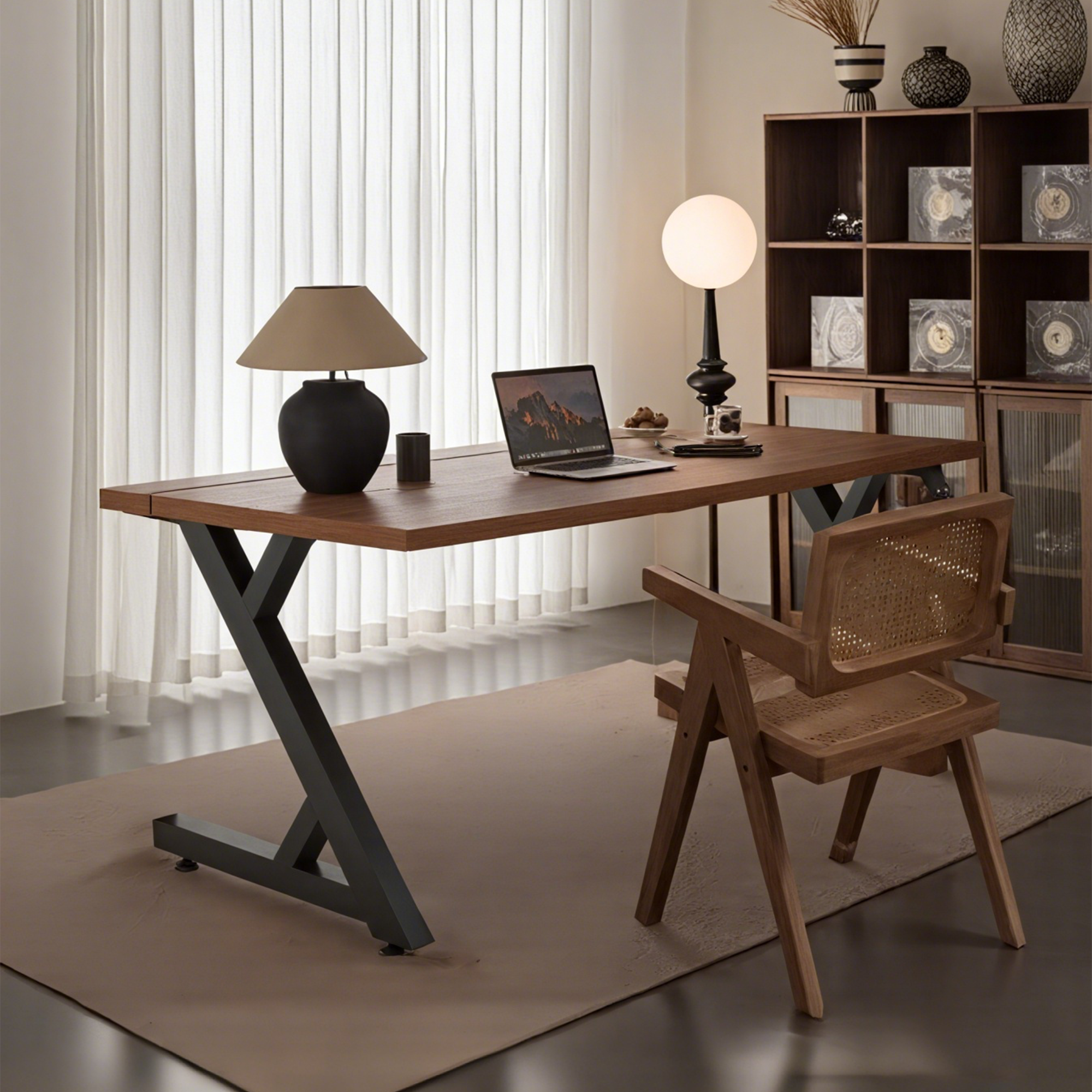 S3 Walnut gaming desk with modern dark metal Z-legs, laptop, & lamp in a contemporary room.